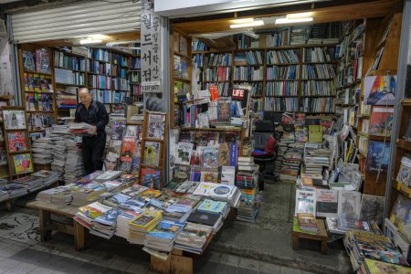 Photo for Busan, South Korea - May 26, 2023: A book seller on Bosu-dong Book Street, it is a famous book selling street in Busan, South Korea. - Royalty Free Image