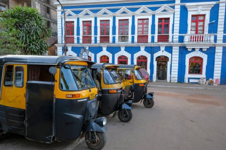 Photo for Panaji, India - February 2, 2024: Auto rickshaws stop in front of the Church of the Immaculate Conception in Panaji, Goa, India. - Royalty Free Image