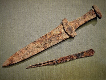 Photo for Ancient Scythian sword Dagger Akinak, Akinak 5th - 3rd century BC and a Scythian knife with an ornament. Scythian akinak - Royalty Free Image