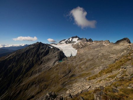 Photo for Alpine landscape panorama of white glacier ice on summit of Mount Brewster Southern Alps seen from Mount Armstrong West Coast Otago South Island New Zealand - Royalty Free Image