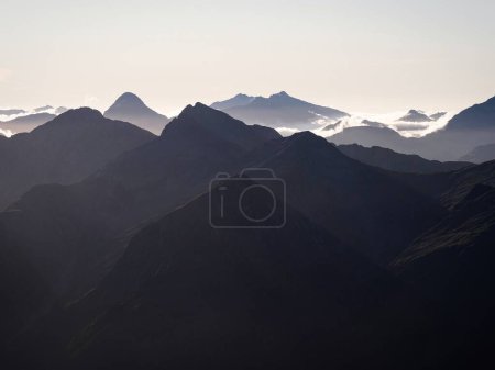 Photo for Alpine mountain silhouette layers, nature landscape panorama seen from Mount Armstrong Brewster Hut West Coast Otago Southern Alps South Island New Zealand - Royalty Free Image