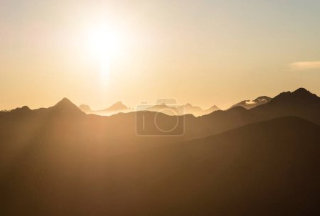 Photo for Alpine sunset mountain silhouette layers, nature landscape panorama seen from Mount Armstrong Brewster Hut West Coast Otago Southern Alps South Island New Zealand - Royalty Free Image