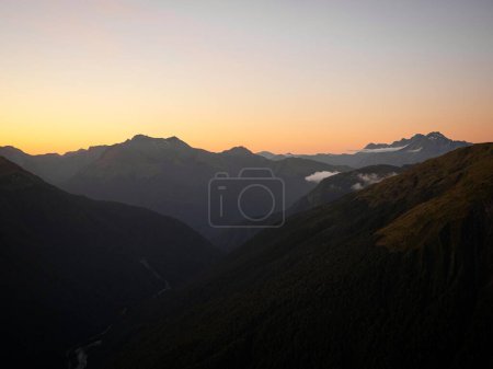 Photo for Alpine mountain valley sunset, nature landscape panorama seen from Mount Armstrong Brewster Hut West Coast Otago Southern Alps South Island New Zealand - Royalty Free Image