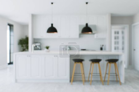Foto de El fondo de la cocina está fuera de foco. Cocina blanca borrosa con isla, lámparas, taburetes de bar y electrodomésticos de cocina. Renderizado 3D - Imagen libre de derechos
