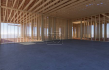Photo for Construction of a frame house. Defocused concept image of a house under construction with a blurred background. Wooden truss frame and walls against blue sky. 3D visualization - Royalty Free Image