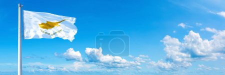 Photo for Cyprus Flag - state of Europe, flag waving on a blue sky in beautiful clouds - Horizontal banner - Royalty Free Image