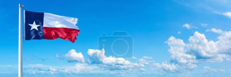 Photo for Texas flag - state of USA, flag waving on a blue sky in beautiful clouds - Horizontal banner - Royalty Free Image