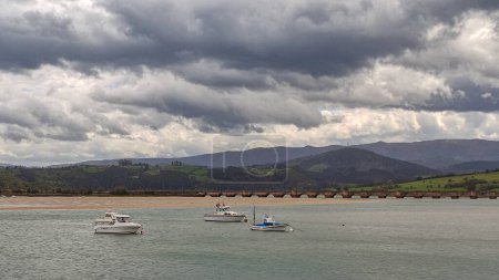 View of San Vicente de la Barquera estuary. The town is a well-known travel destination in the Northern coast of Spain