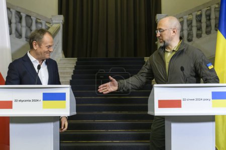 Photo for Polish Prime Minister Donald Tusk and Ukrainian Prime Minister Denys Shmyhal are shaking hands after a joint press conference in Kyiv, Ukraine, on January 22, 2024. High quality photo - Royalty Free Image
