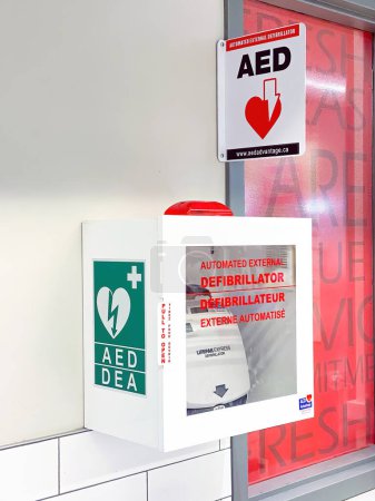 Photo for Nov 15, 2022. Calgary, Alberta, Canada. An automated external defibrillator (AED) at a grocery store. - Royalty Free Image