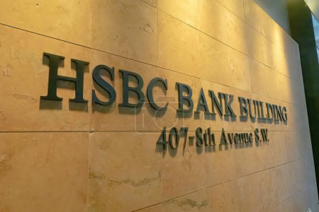 Photo for Nov 25, 2022. Calgary, Alberta, Canada. A HSBC bank branch bank building entrance sign. - Royalty Free Image