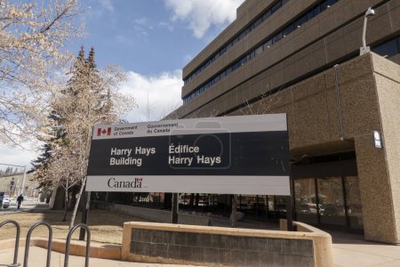 Photo for Calgary, Alberta, Canada. Apr 24, 2023. A Government of Canada building Harry Hays sign. - Royalty Free Image