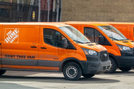 Photo for Calgary, Alberta, Canada. Apr 26, 2023. The Home Depot Vans for rent. - Royalty Free Image