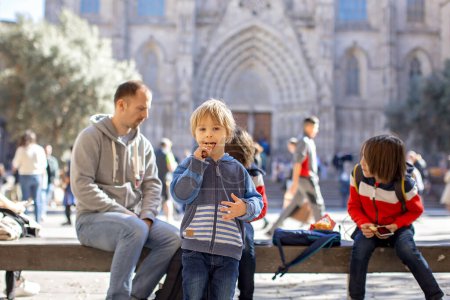 Photo for Cute little children tourists admiring Barcelona city, family travel with kids in Spain - Royalty Free Image