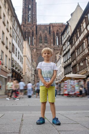 Photo for Beautiful family with children, boys, visiting Strasbourg in France during summer vacation - Royalty Free Image