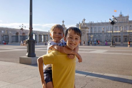 Photo for Family with children, siblings, visiting Madrid during family vacation summertime in Spain - Royalty Free Image