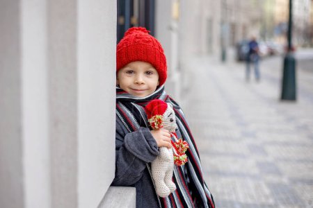 Photo for Child in Prague on Christmas, looking at the store windows - Royalty Free Image