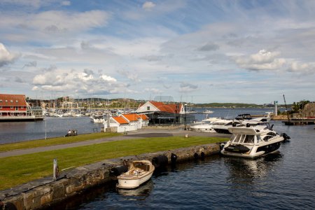 Beautiful town Kristiansand in Norway, family visiting Norway for summer vacation, kids enjoying amazing views