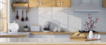 Foto de Mínima mesa de cocina de mármol blanco con cesta de pan, servilleta, condimento y espacio de copia para la exhibición del producto sobre el estilo de cocina escandinava borrosa en el fondo. 3d render, ilustración 3d - Imagen libre de derechos