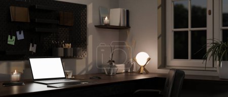 Foto de Close-up image, Modern home workspace at night with laptop white screen mockup, table lamp, accessories and pegboard on the wall. 3d render, 3d illustration - Imagen libre de derechos
