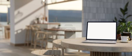 Eine Laptop-Attrappe mit weißem Bildschirm auf einem Tisch in einem modernen, skandinavischen Café. Nahaufnahme aus dem Arbeitsbereich. 3D-Renderer, 3D-Illustration