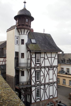 Photo for Multistory timber-framed old house with a turret in the heart of the old town, at Hauser Gasse 20, Wetzlar, Germany - February 4, 2023 - Royalty Free Image