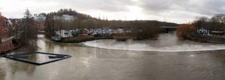 Photo for Rapids on the river Lahn, panoramic view on gloomy afternoon, downstream from the Old Lahnbridge, Wetzlar, Germany - February 4, 2023 - Royalty Free Image