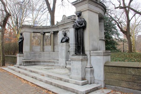 Photo for Richard Morris Hunt Memorial, stone exedra with the bust and allegoric sculptures, designed by Bruce Price, sculptures by Daniel C. French, unveiled in 1898, at 70th Street, by the Central Park East, New York, NY, USA - December 23, 2023 - Royalty Free Image