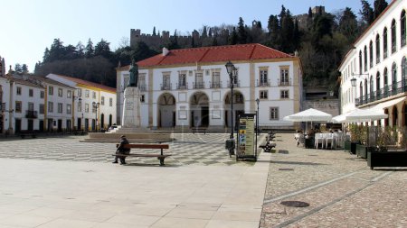 Photo for Republic Square, with the Town Hall building and Monument to Gualdim Pais, founder of the town, Tomar, Portugal - February 6, 2024 - Royalty Free Image