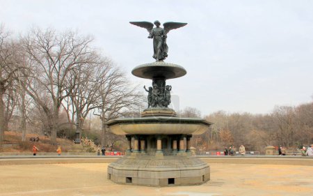 Bethesda Fountain, detail, the Angel of the Waters statue, in Central Park, completed in 1873, view on snowless winter afternoon, New York, NY, USA - December 23, 2023