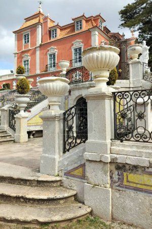 Marques de Pombal Palace, built in second half of the 18th century in Baroque and Rococo styles, garden side entrance stairs and porch, Oeiras, Lisbon, Portugal - March 5, 2024