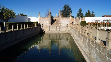 Water reservoir, the Great Tank, with cascade fountain, the Moses Waterfall, in The Garden of the Episcopal Palace, Jardim do Paco, Castelo Branco, Portugal - November 24, 2023