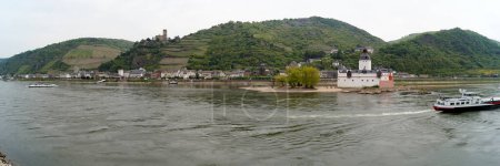 Pfalzgrafenstein Castle, built on the Falkenau island on the River Rhine in 14th century as a toll-collecting station, panoramic shot across the river, Kaub, Germany - May 5, 2022