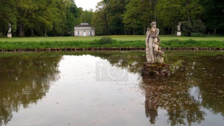 Pond in the park of the Fasanerie Castle, view in the early evening twilight, Eichenzell, near Fulda, Germany - May 10, 2022