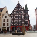 Ornate timber-framed Old City Hall, Altes Rathaus, originally built around 1500, now reconstructed and renovated, view from Borgiasplatz, Fulda, Germany - May 10, 2022