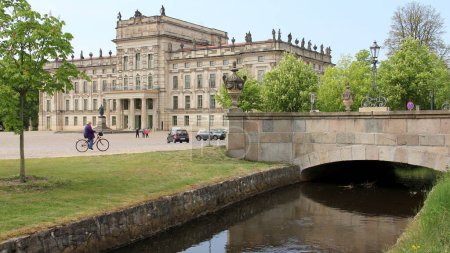 Ducal Palace and stone bridge to the Schlossplatz, over Ludwigsluster Canal, Ludwigslust, Mecklenburg-Vorpommern, Germany - May 3, 2012