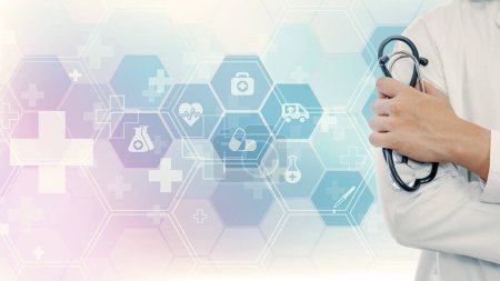 healthcare background of doctor hand holding stethoscope on background of medical symbol