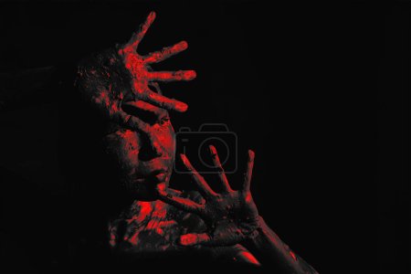 Photo for Abstract bodypaint for Halloween concept of woman in fancy makeup of scary bloody woman on dark background - Royalty Free Image