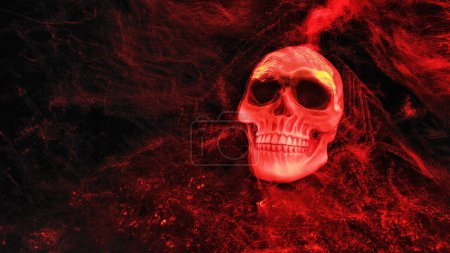 Photo for A menacing skull emerges from the darkness, highlighted with a red fiber optic brush, creating a chilling scene perfect for Halloween - Royalty Free Image