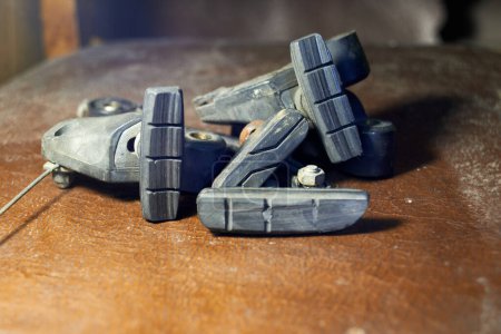 Photo for Photo of used bike brake pads on the table - Royalty Free Image
