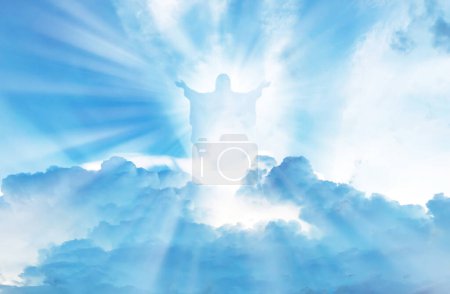 Foto de Jesus Christ In The Clouds Of Heaven blue sky background,good friday concept - Imagen libre de derechos