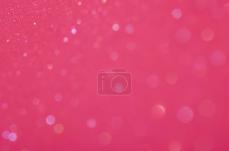Téléchargez les photos : Petits scintillements flous de couleur rose forment un bokeh de différentes tailles. - en image libre de droit
