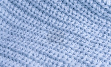 Téléchargez les photos : Fond tricoté texturé de couleur bleue. Gros plan. - en image libre de droit