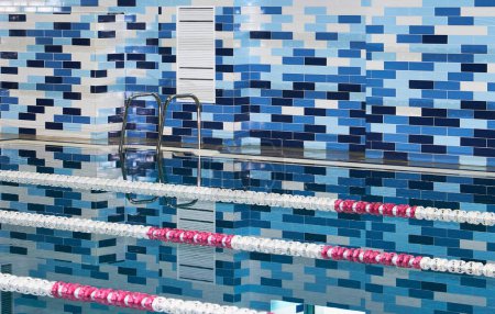 Blue swimming pool lanes, a symbol of sport