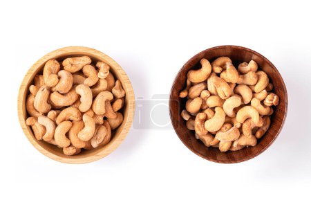 cashew in shell and shell on white background, top view