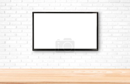 Foto de Pantalla de TV inteligente en la pared de ladrillo blanco - Imagen libre de derechos