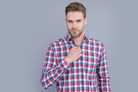 Photo for Handsome guy in checkered shirt isolated on grey background. guy in casual style. studio shot of guy. caucasian guy having stubble. - Royalty Free Image