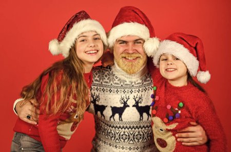 Photo for Dad and kids having fun. Father and little daughters celebrate new year together. Christmas becomes special with children. Christmas eve concept. Winter holidays. Family time. Holly jolly christmas. - Royalty Free Image