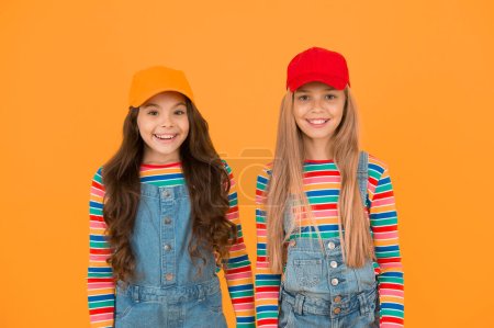 Photo for Universal childrens day. Promote international togetherness awareness among children worldwide and improving childrens welfare. Happy girls. Friendly and happy children. Family look. Stylish children. - Royalty Free Image