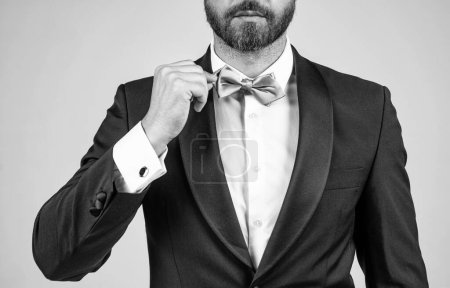 Photo for Cropped bearded businessman with bristle. male beauty and fashion. menswear and formalwear. bride groom. esthete wear bow tie. successful mature aristocrat. man in tuxedo. - Royalty Free Image